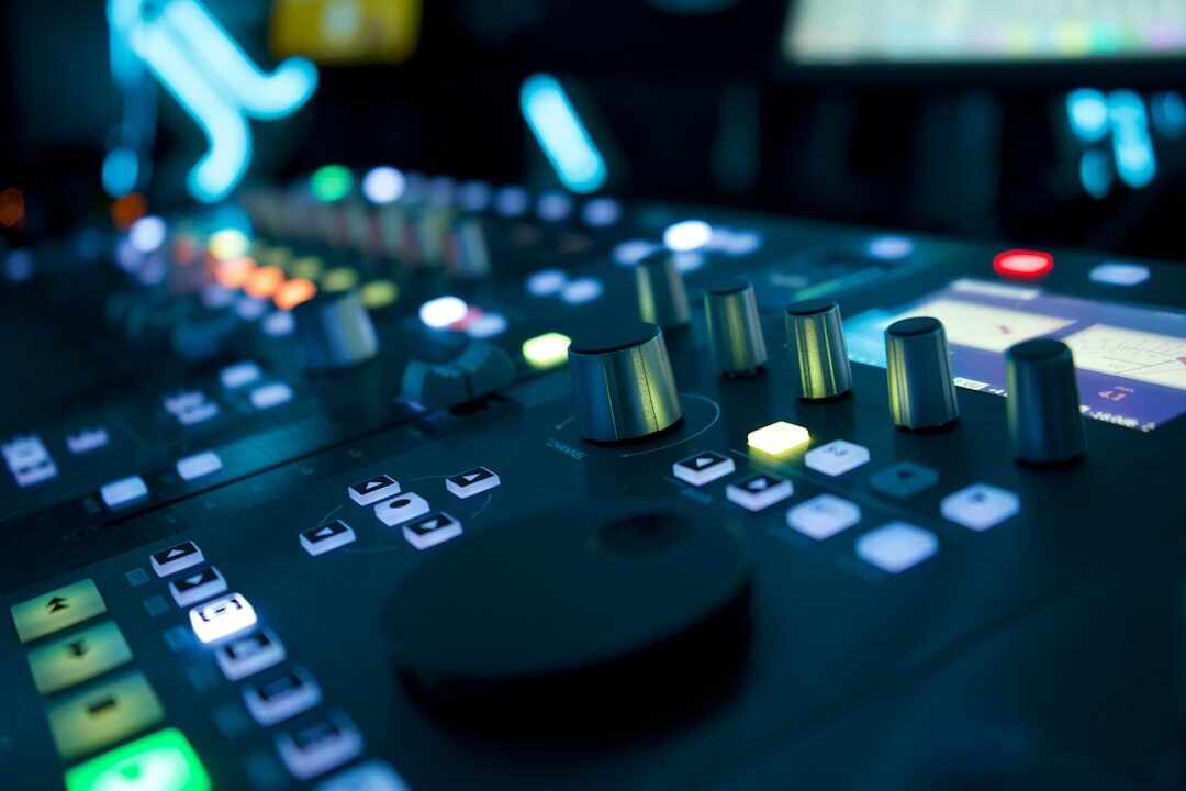 Students practicing at video switcher during broadcast training